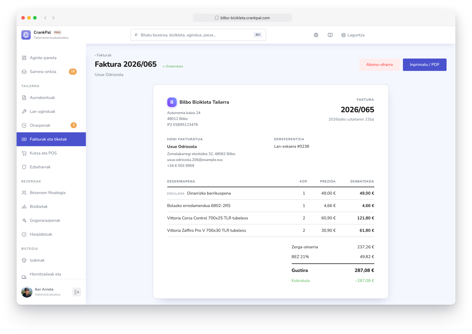 Fattura elettronica nel gestionale CrankPal con righe di manodopera e ricambi, totale, IVA, stato pagata, download XML della fattura elettronica, stampa PDF e nota di credito.