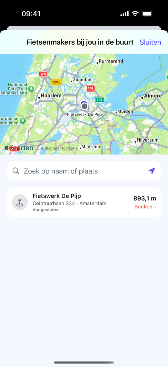 De CrankPal-app: de kaart met werkplaatsen in de buurt, met de kaart van de werkplaats, de afstand en de knop om te boeken
