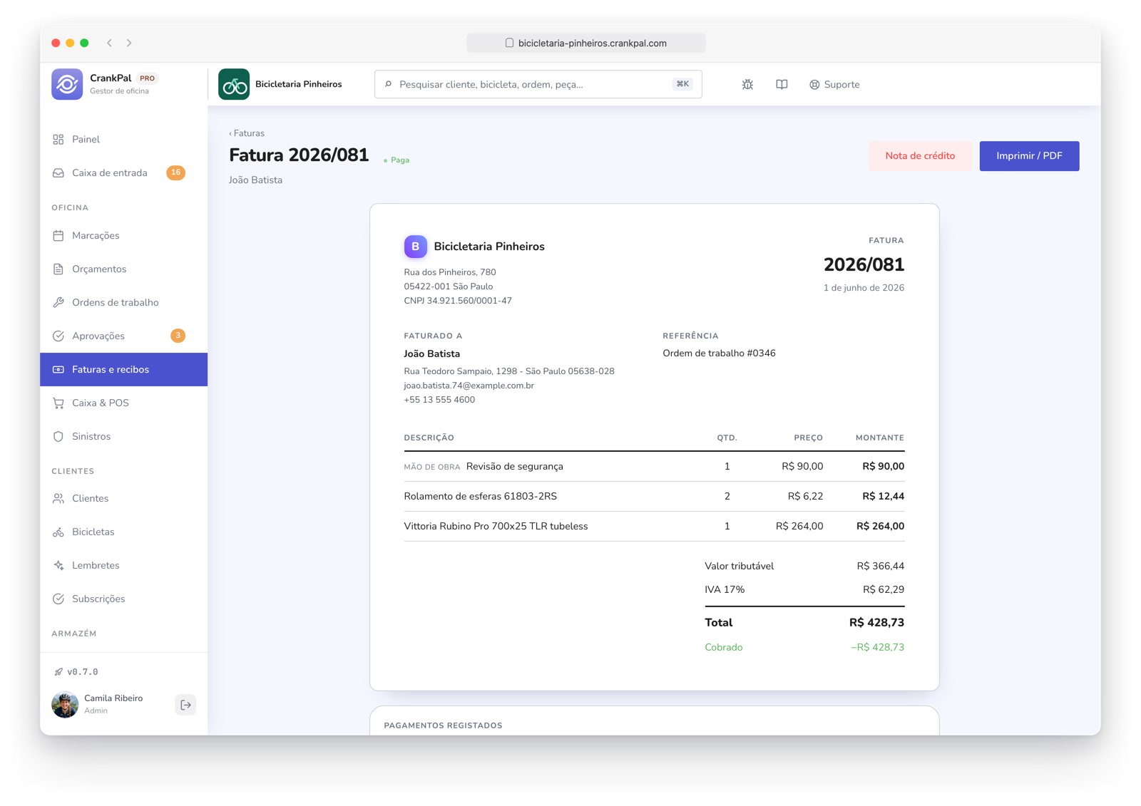 Fattura elettronica nel gestionale CrankPal con righe di manodopera e ricambi, totale, IVA, stato pagata, download XML della fattura elettronica, stampa PDF e nota di credito.